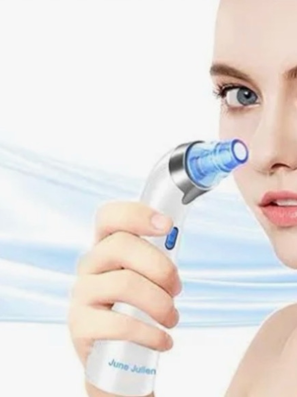 New June Julien rechargeable vacuum tool for exfoliation and acne extraction.